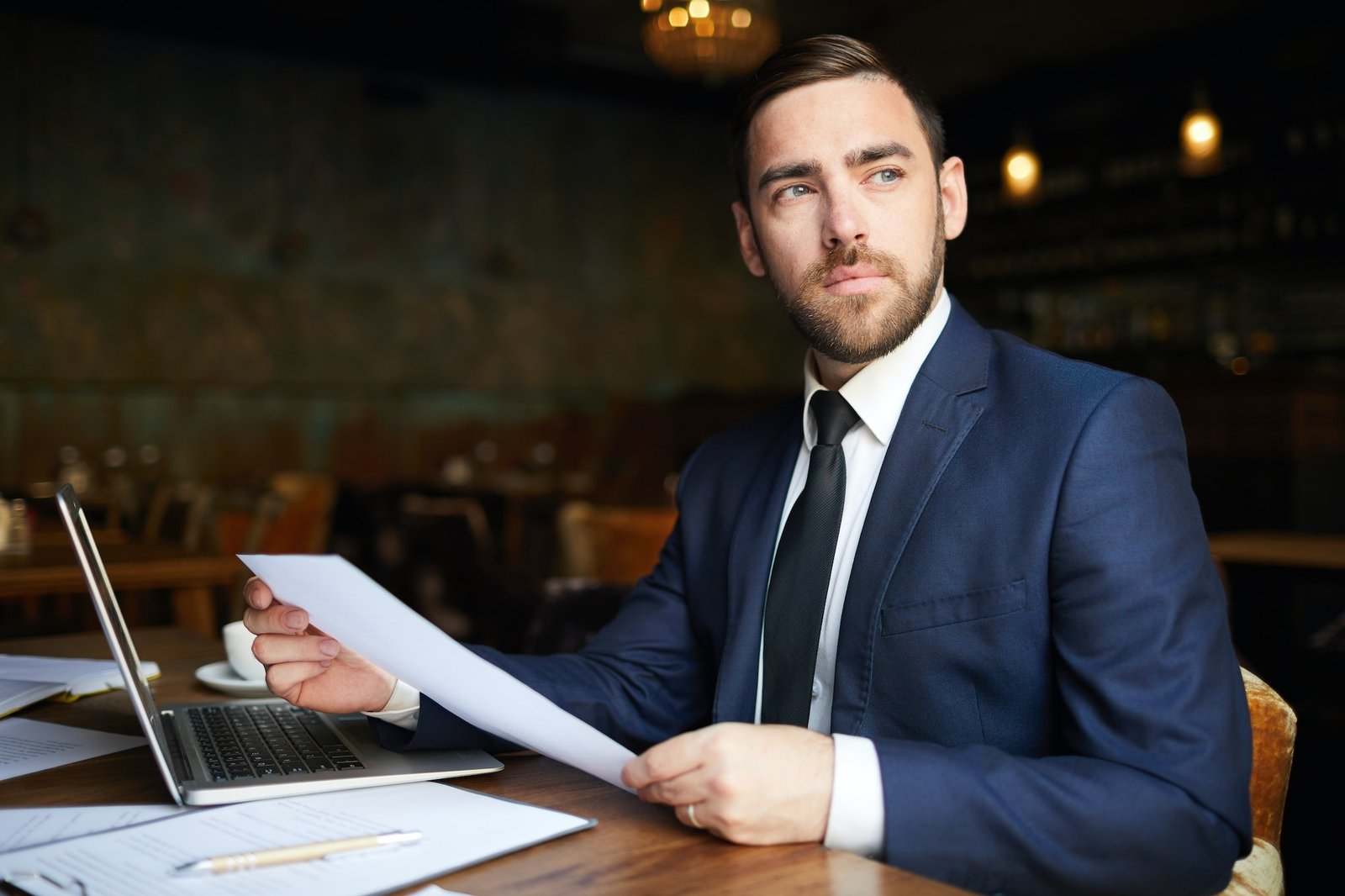 successful-business-consultant-with-papers.jpg
